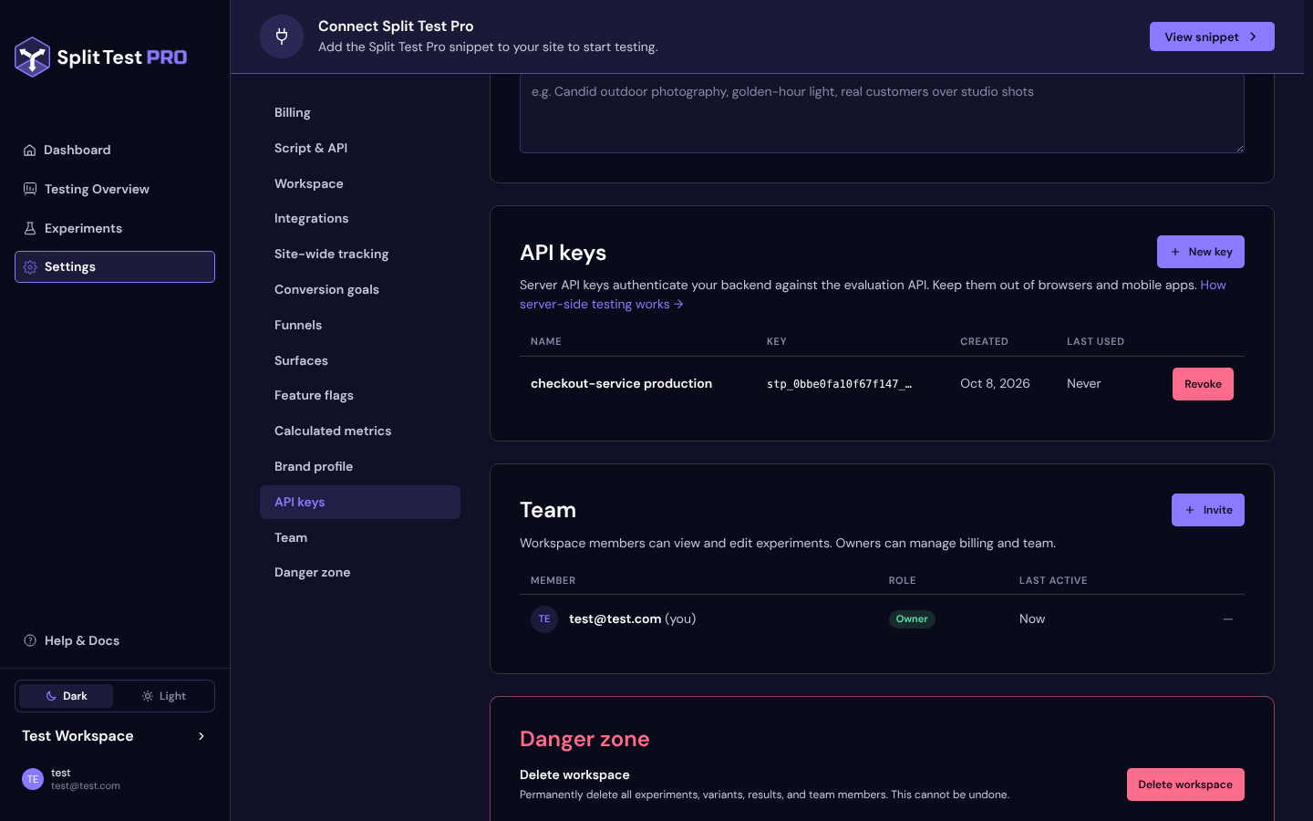 The API keys card in Settings with one key row showing its name, the masked key stp_ followed by the key id and an ellipsis, its created and last used dates, and a Revoke button
